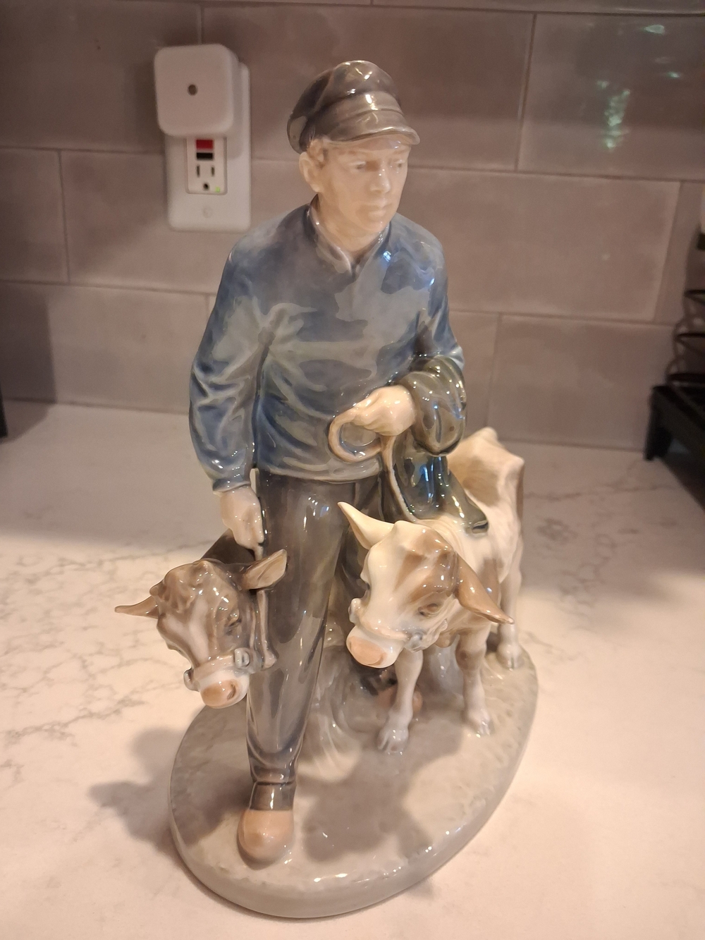 Royal Copenhagen Glazed Farmer Figurine in Blue and Cream